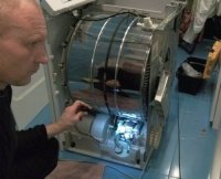 Течет вода, подтекает в сушильной машине Smeg